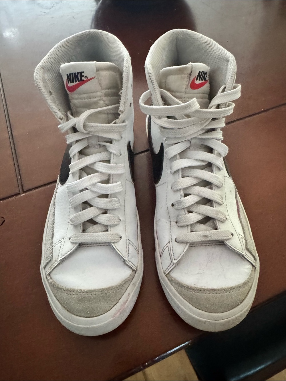 Nike White and Black High-Top Athletic Sneakers with Red Swoosh